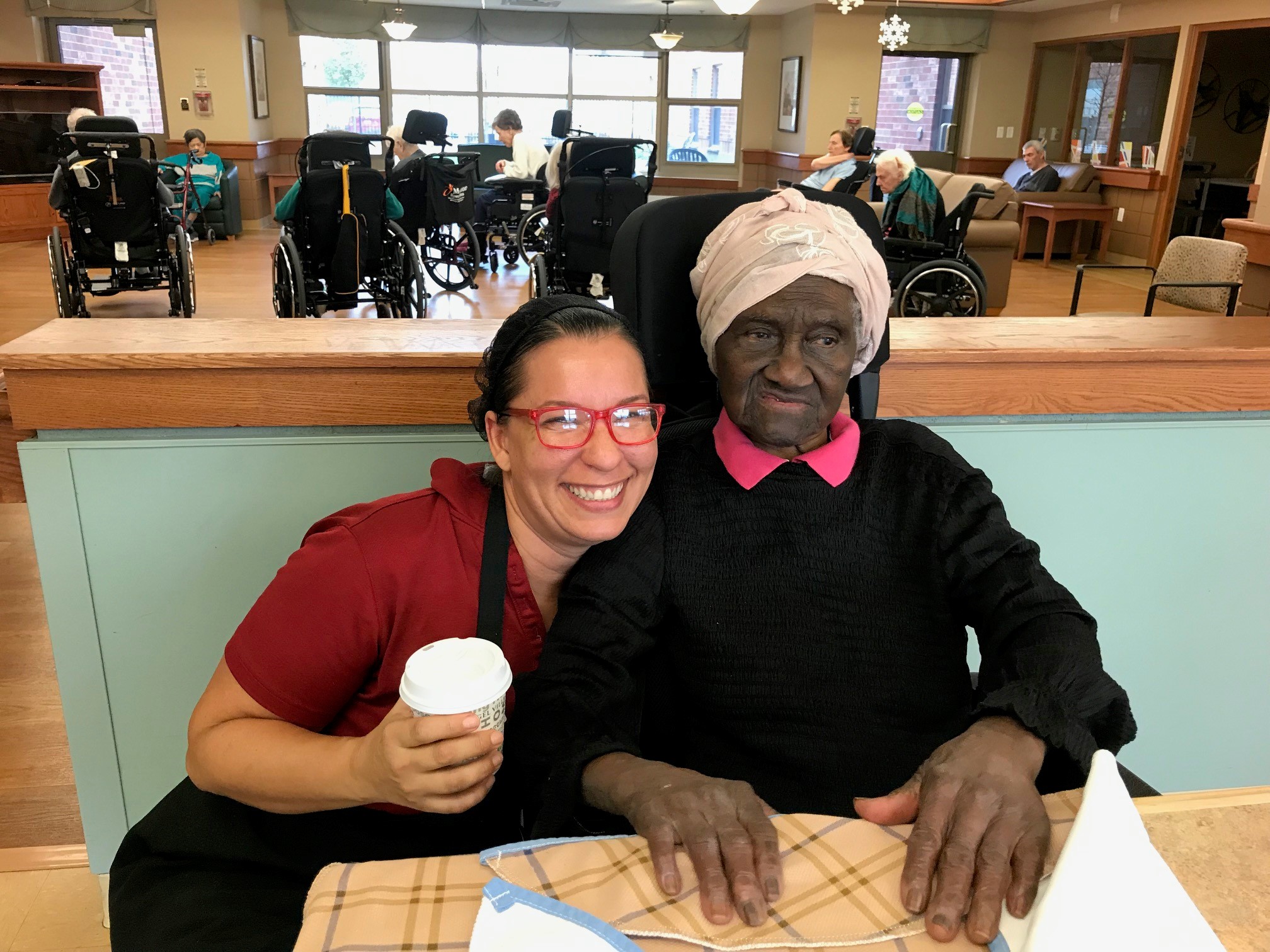 As a dietary aide, Chantal was able to develop more  meaningful connections with residents when a dishwasher in the neighbourhood created efficiencies. Albertina is just one of  many residents Chantal enjoys connecting with at St. Clair. 
