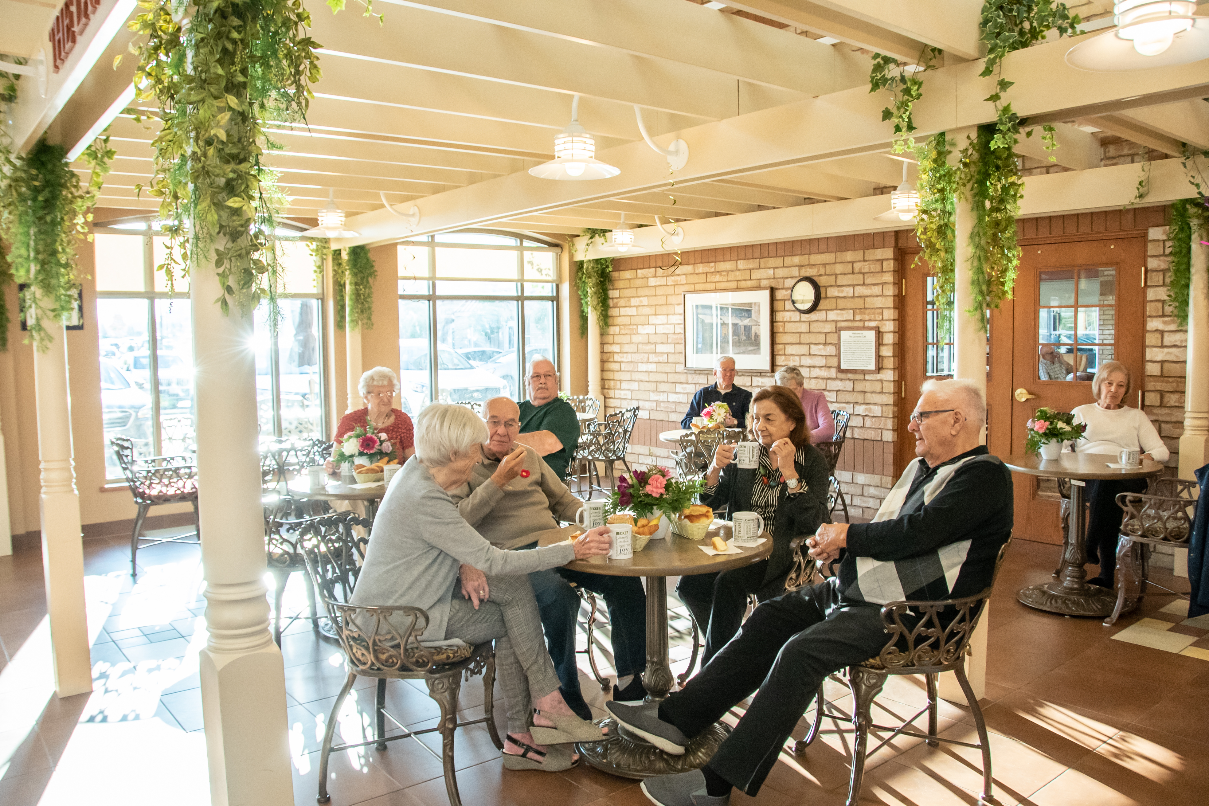 Residents socializing in the Village Cafe