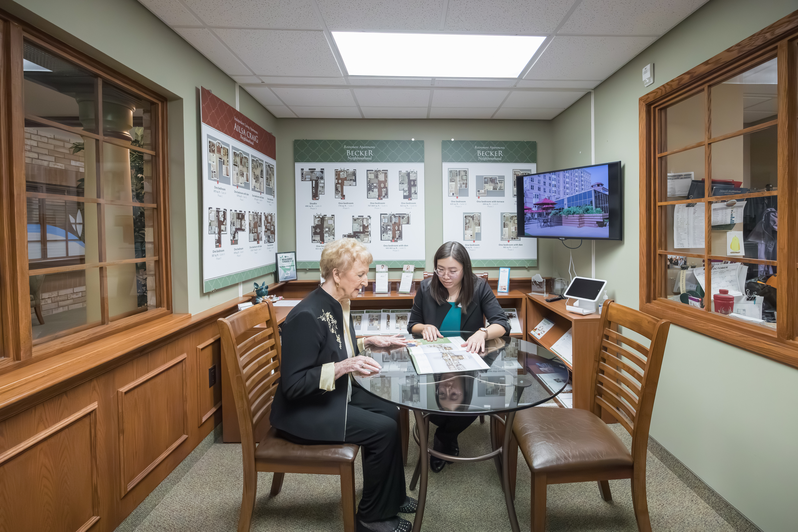 Director of Lifestyle Options meets with future resident in the Welcome Centre at The Village of Tansley Woods