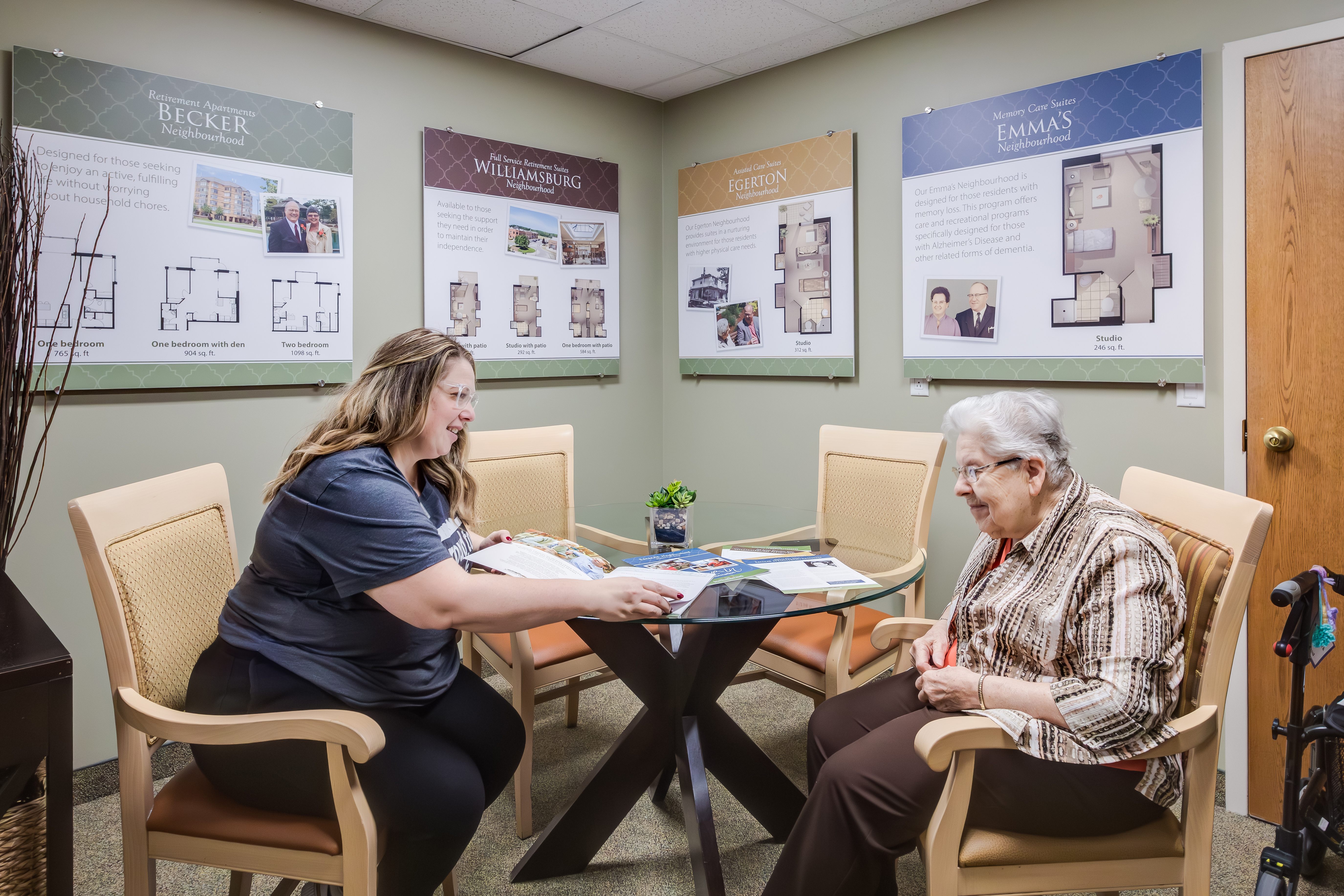 Director of Lifestyle Options meets with future resident in the Welcome Centre at The Village of Winston Park